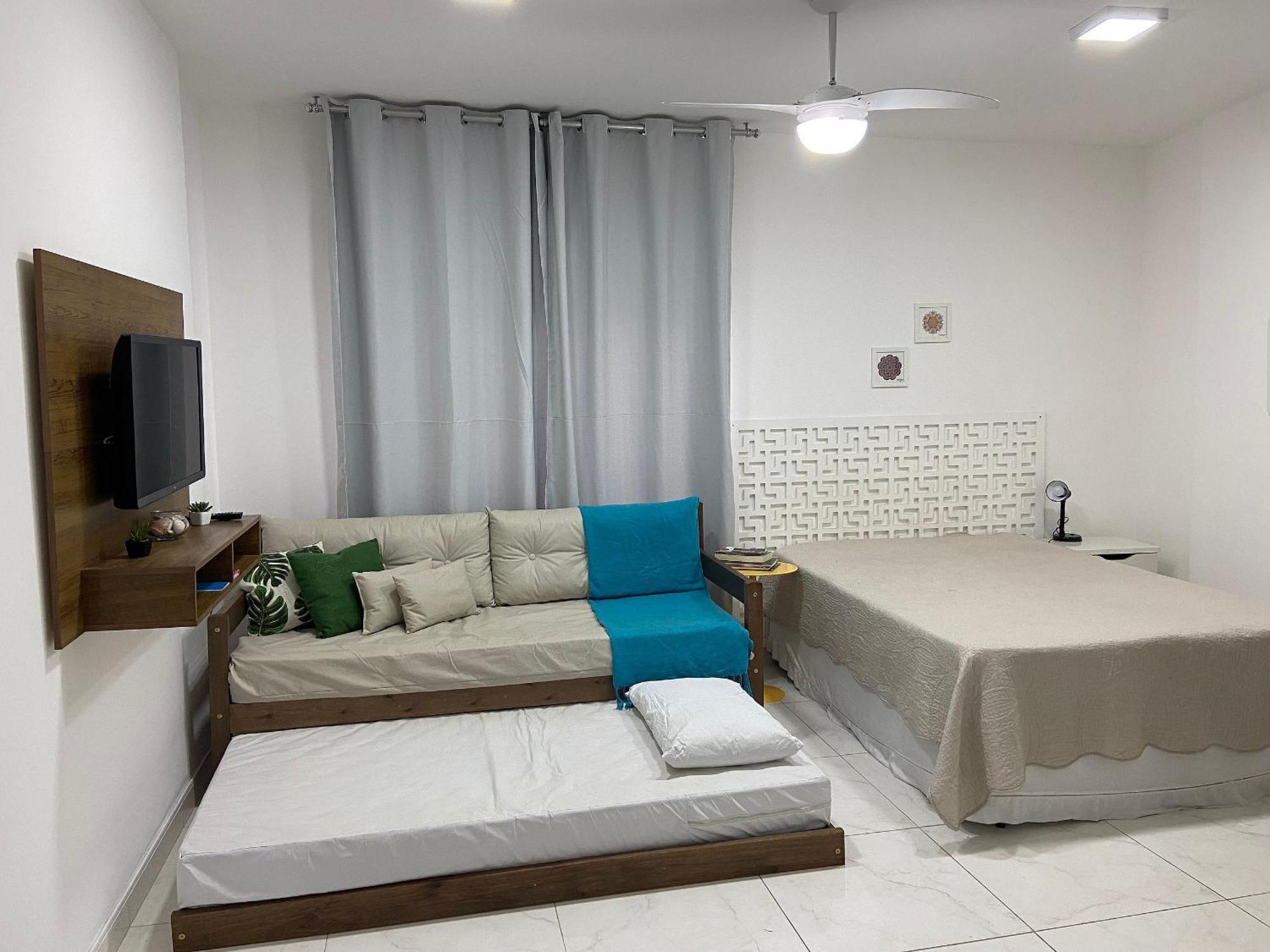 Apartamento Loft moderno pé na areia a 50 metros do mar Pitangueiras Guarujá Exterior foto